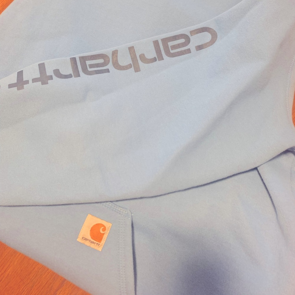 Blue Carhartt men’s hoodie in excellent condition. Size L Tall original fit.